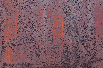 Old grunge rustic iron metal texture background. Pink colored plate.