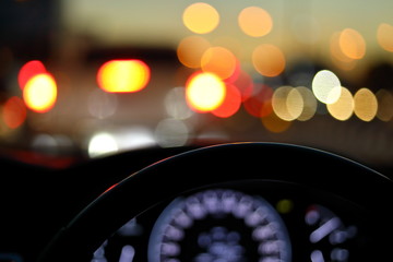 vehicle car steering wheel and blur bokeh abstract background
