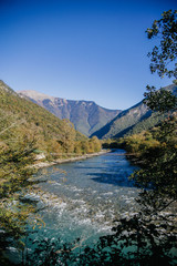 Landscape with blue mountain river. autumn view
