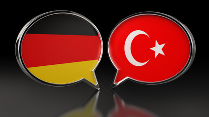 Germany and Turkey flags with Speech Bubbles. 3D illustration