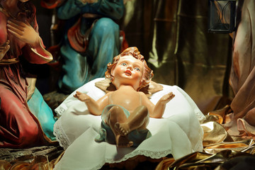 Christmas Nativity scene in the church, virgin Mary and Saint Joseph with Holy infant Jesus