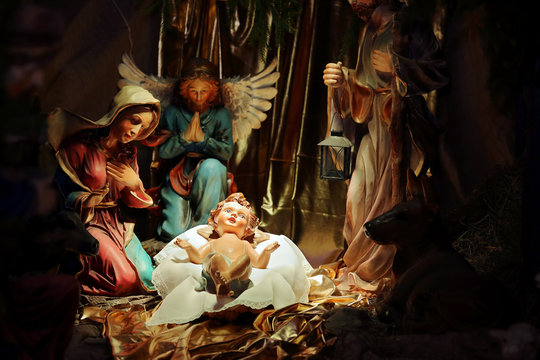 Christmas Nativity scene in the church, virgin Mary and Saint Joseph with Holy infant Jesus