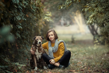 Friendship between a girl and a dog