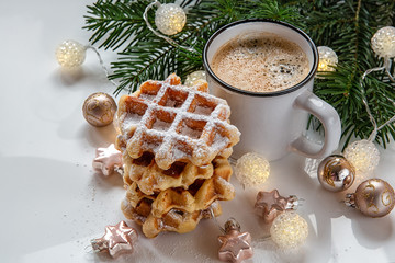 Christmas background.Breakfast waffles with coffee.