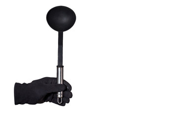 gloved hand holding a ladle on an isolated white background