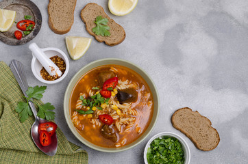 Thick red soup with pasta