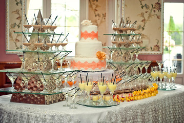 Glass glasses with colored drinks on the table. alcoholic drinks at the buffet