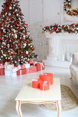 White wiith red Christmas decorations, Christmas tree, gifts, fireplace