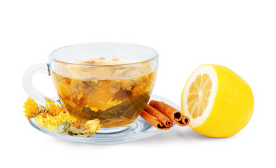 Herbal tea in a mug with lemon and cinnamon on a white background
