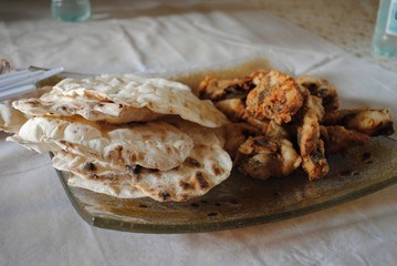 Deep fried carp served with fresh bread, Poland