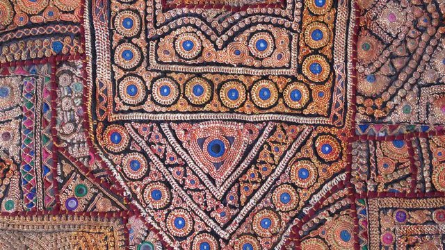 Detail old colorful patchwork carpet. Close up