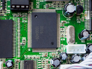Electronic circuit board close up.