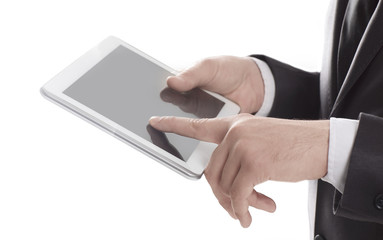 close up.businessman tapping on the screen of digital tablet