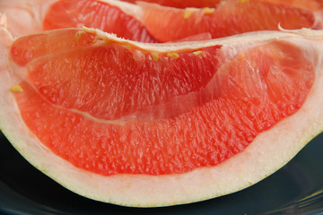Piece of red pomelo