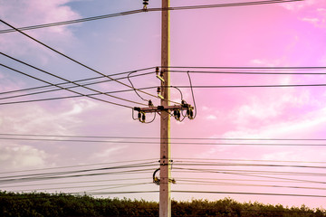 Electricity pole against blue sky clouds, Transmission line of electricity to rural, High voltage...