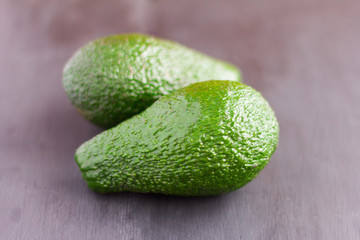 fresh avocado on an old wooden table