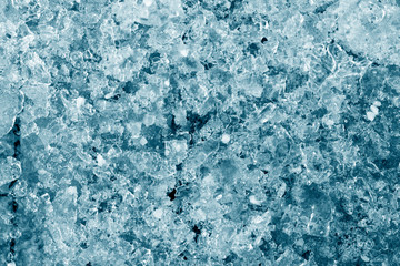 Many pieces of broken ice, close-up, texture, background.