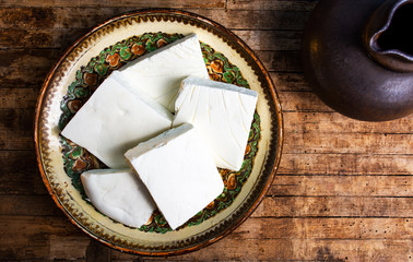 Domestic cow cheese on a plate