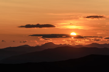 mountains sun sunrise clouds sky