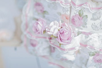 delicate composition of roses on a glass table
