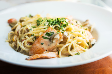 tasty pasta with salmon on a the table