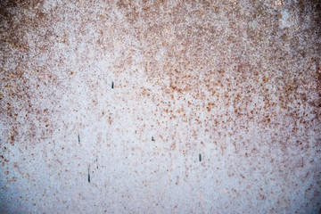 rusty sheetsmall rust stains on a light blue background