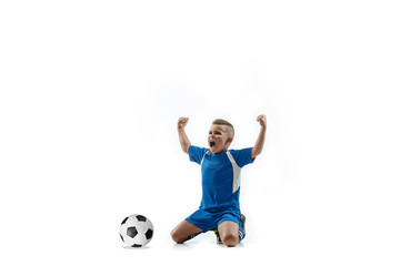 Young boy with soccer ball doing flying kick, isolated on white. football soccer players in motion on studio background. Fit jumping boy in action, jump, movement at game. © master1305
