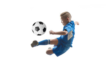 Young boy with soccer ball doing flying kick, isolated on white. football soccer players in motion...