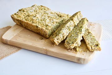 Tasty yellow seedy bread on the wood