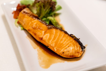 grilled salmon steak with sauce
