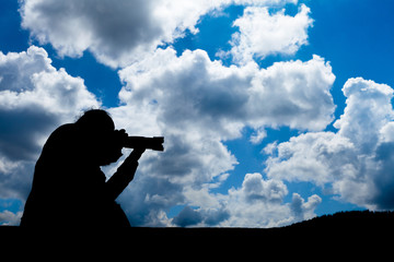 Elderly photographer silhouette