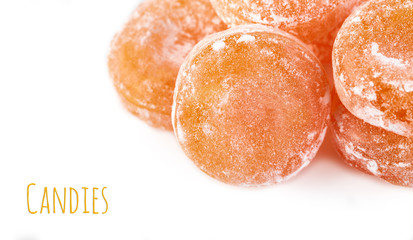 Colored round candy in powdered sugar. Bright candy.