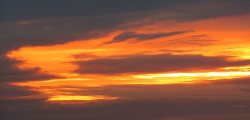 Beautiful fiery orange sunset background, panoramic view
