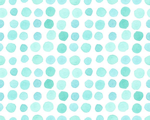 Seamless pattern with arranged rows of turquoise blue polka dots painted in watercolor on white isolated background