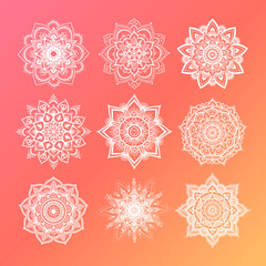 Set of round gradient mandala on living coral color of the year. Vector hipster white mandala on rose pink background. Mandala with floral patterns. Yoga template.