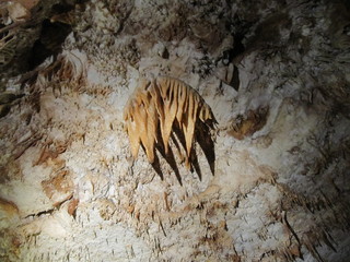Fototapeta na wymiar Salt cave in an old mine with natural stalactites.