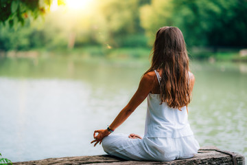 Meditation by the Water. Yoga Woman