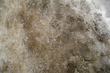 Dirty ice background in winter on the road. texture.