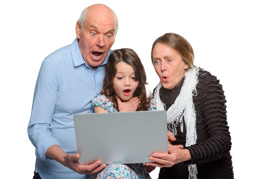 Shocked Grandparents And Granddaughter