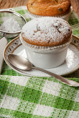 Tasty muffins on wooden boards