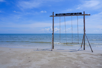 Double swings on the sand beautiful tropical beach at Trat, Thailand.