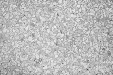 Monochrome gray stone wall terrazzo background. Copy space, top view