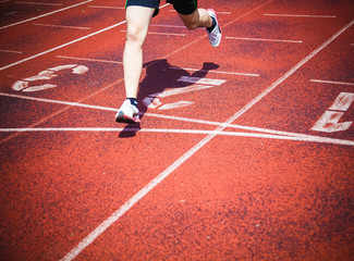 runner reaching finish line