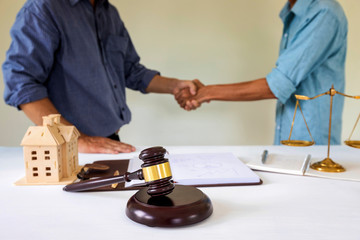 Judge gavel with lawyer bakground. Concepts of housing and real estate law.