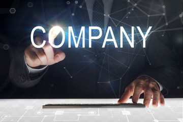 Business man touching screen with 