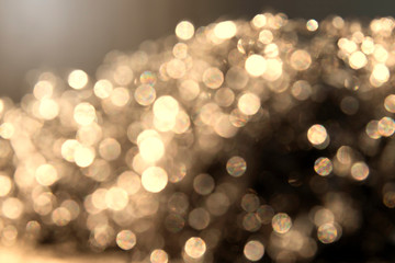 Obraz premium Golden Abstract bokeh light effect on background