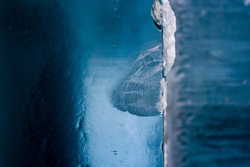 beautiful clear blue ice with chipped and cracked