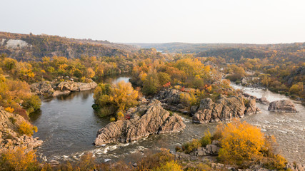Fototapeta premium The Southern Bug River. Picturesque rocks and river rapids.Shooting from the air