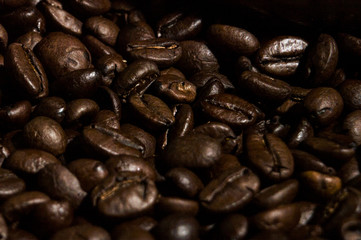 Grains of coffee scattered on the table