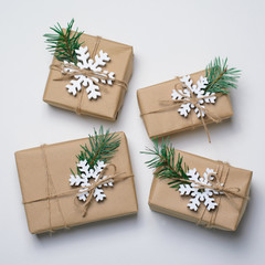Christmas Gifts with Fir Branches on White Background, Winter Holidays Concept
